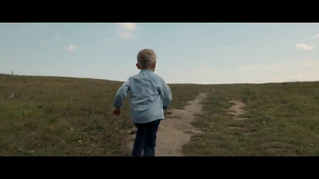 Video Reference: Grassland, Photograph, Prairie, Natural environment, Steppe, Plain, Hill, Ecoregion, Pasture, Field, Person