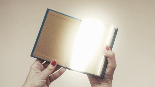 Video Reference: Text, Hand, Notebook, Design, Technology, Material property, Book, Electronic device, Paper, Writing, Person, Indoor, Holding, Man, Wearing, Woman, Front, Young, Smiling, Mirror, Shirt, White, Room, Standing, Living, Wall, Mobile phone, Office supplies, Pen, Laptop