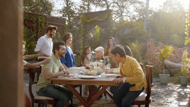 Video Reference: meal, restaurant, recreation, leisure, eating, lunch, conversation, table, picnic, fun, Person