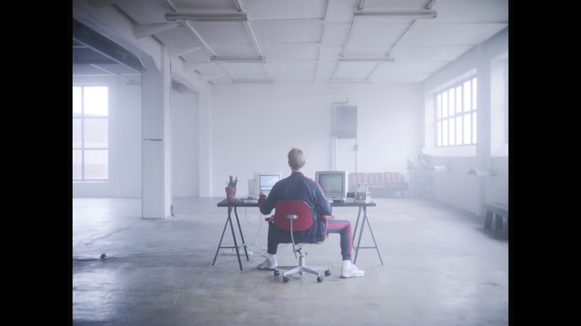 Video Reference: White, Sitting, Chair, Photography, Furniture, Room, Architecture, Space, Flooring, Floor, Person