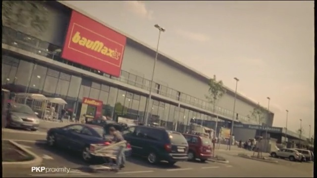 Video Reference: car, mode of transport, vehicle, family car, building, luxury vehicle, compact car, road, advertising, sky