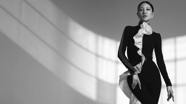 Video Reference: Clothing, Black-and-white, Suit, Fashion, Standing, Fashion model, Beauty, Monochrome photography, Model, Fashion design, Person