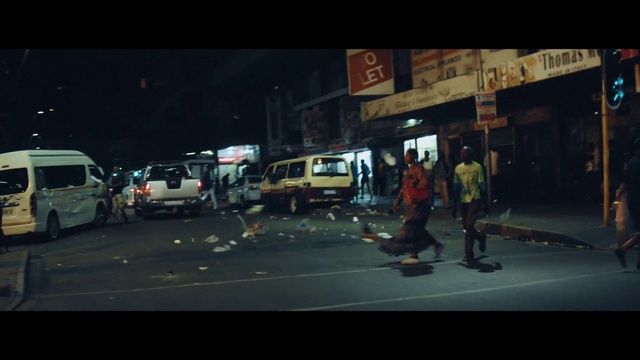 Video Reference: Motor vehicle, Mode of transport, Pedestrian, Transport, Lane, Street, Vehicle, Snapshot, Town, Urban area