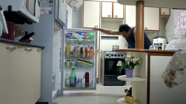 Video Reference: Refrigerator, Room, Shelf, Kitchen appliance, Home appliance, Major appliance, Furniture, Cabinetry, Building, Interior design, Person