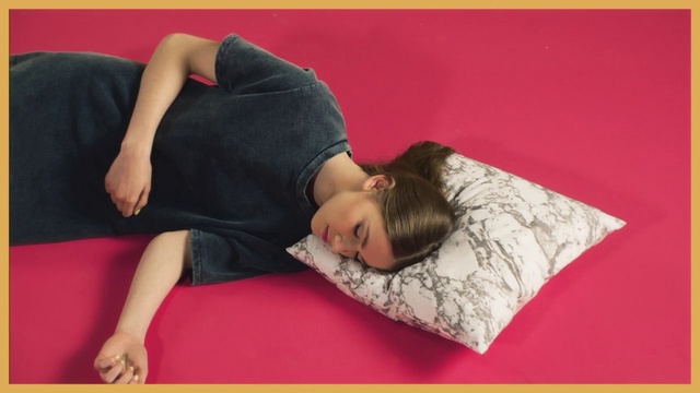 Video Reference: Comfort, Joint, Arm, Mattress, Leg, Sleep, Furniture, Pillow, Neck, Nap, Person, Indoor, Laying, Small, Sofa, Woman, Girl, Bed, Sitting, Child, Lying, Young, Yellow, Black, Holding, Large, Red, Television, Little, Table, Laptop, Room, Computer, Sleeping, Cat, Stuffed, Rug, Bear, Playing, White, Toddler, Baby, Human face, Clothing, Text, Boy