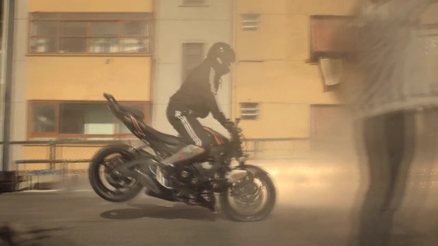 Video Reference: motorcycle, mode of transport, vehicle, car, stunt performer, stunt, supermoto, racing