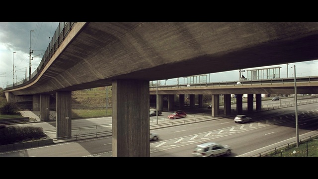 Video Reference: urban area, transport, overpass, infrastructure, architecture, track, metropolitan area, structure, sky, road