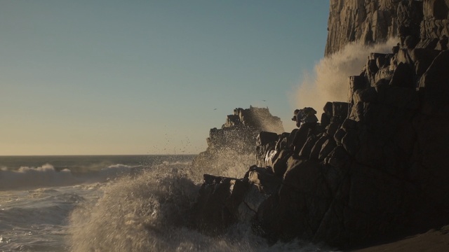Video Reference: Wave, Cliff, Sky, Sea, Rock, Water, Coast, Atmospheric phenomenon, Klippe, Ocean, Person