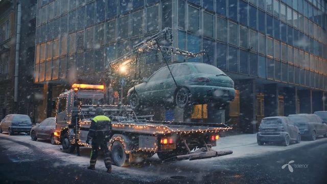 Video Reference: transport, snow, urban area, car, winter, vehicle, tree, downtown, evening, freezing, Person