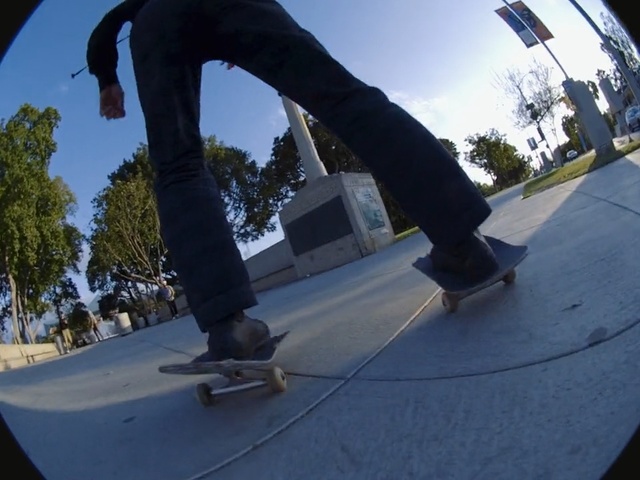 Video Reference: Skateboarding, Skateboarder, Kickflip, Recreation, Skateboard, Boardsport, Photography, Freebord, Fisheye lens, Skateboarding equipment, Outdoor, Person, Man, Riding, Park, Ramp, Trick, Young, Doing, Board, Side, Boy, Jumping, Air, Performing, Skating, Sky, Footwear, Snowboarding, Sports equipment, Longboarding, Roller sport, Tree, Skatepark, Street stunts, Skate, Longboard, Cement
