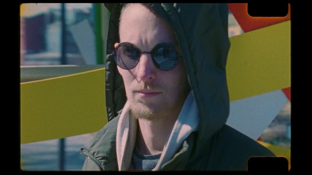 Video Reference: eyewear, sunglasses, vision care, glasses, chin, facial hair, cool, screenshot, Person