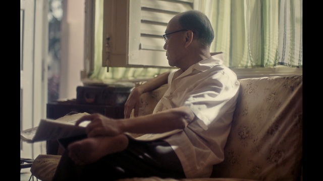 Video Reference: Sitting, Male, Reading, Room, Electronic device, Glasses