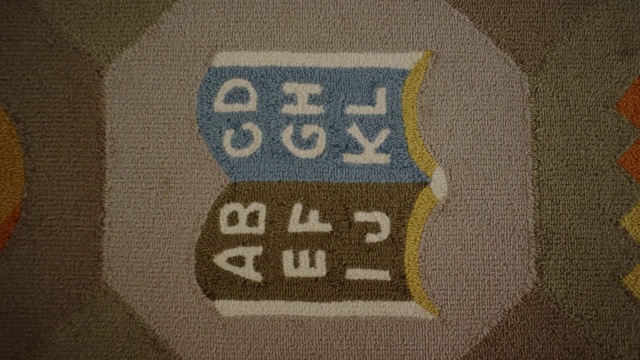 Video Reference: Text, Font, Textile, Number, T-shirt, Shirt, Beige, Symbol, Logo