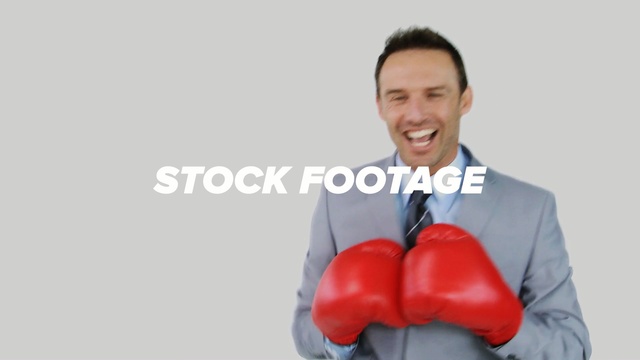 Video Reference: boxing equipment, shoulder, product, boxing glove, arm, sports equipment, neck, aggression, Person