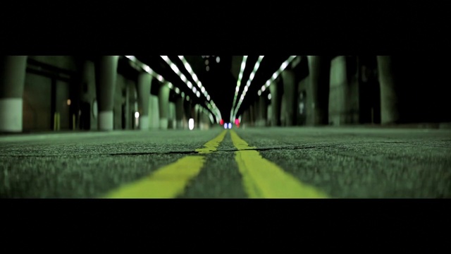 Video Reference: Green, Light, Symmetry, Mode of transport, Darkness, Line, Grass, Infrastructure, Night, Tree, Person