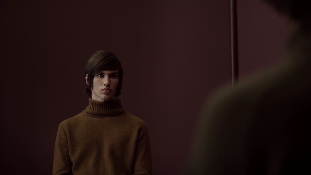 Video Reference: Face, Black, Red, Head, Light, Darkness, Human, Photography, Flash photography, Outerwear, Person