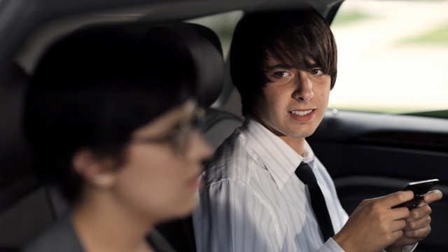 Video Reference: Automotive design, Vehicle, Headgear, Smile, Luxury vehicle, Black hair, Official, Car, White-collar worker, Person