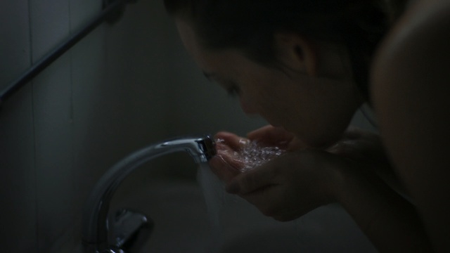 Video Reference: face, water, hand, mouth, darkness, finger, human, girl, lip
