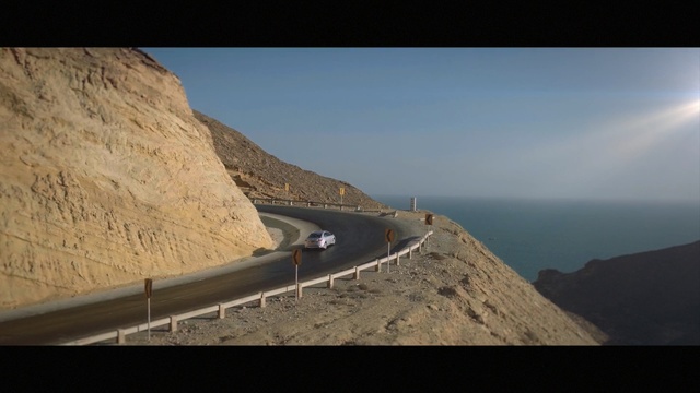 Video Reference: sky, terrain, horizon, fixed link, mountain, cloud, badlands, escarpment, cliff, geology