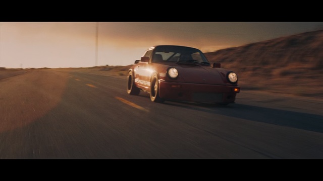 Video Reference: Land vehicle, Vehicle, Car, Regularity rally, Automotive design, Sky, City car, Compact car, Rolling, Landscape
