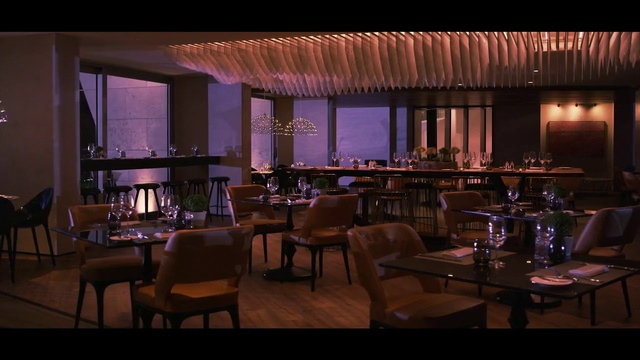 Video Reference: Restaurant, Interior design, Lighting, Room, Building, Table, Furniture, Architecture, Function hall, Night