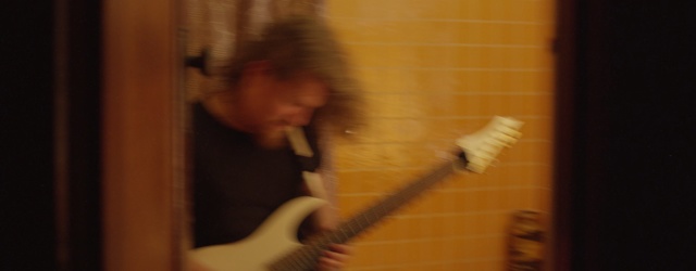 Video Reference: String instrument, Music, Guitar, Musician, Plucked string instruments, Musical instrument, Bass guitar, Electric guitar, Guitarist, Person, Indoor, Teeth, Toothbrush, Woman, Brushing, Holding, Girl, Man, Young, Front, Cutting, Using, Table, Yellow, Kitchen, Brush, Blurry, Mouth, Mirror, White, Cut, Cake, Ball, Standing, Room, Pizza, Playing, Human face, Bowed instrument