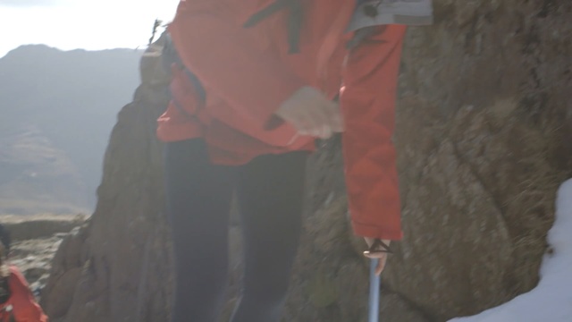 Video Reference: climbing, adventure, geological phenomenon, mountaineer, ridge, rock, mountain, terrain, cliff, sport climbing, Person