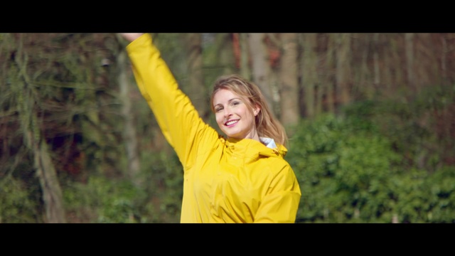 Video Reference: People in nature, Nature, Photograph, Yellow, Facial expression, Lady, Happy, Photography, Fun, Portrait, Person, Outdoor, Grass, Holding, Colored, Young, Standing, Man, Hand, Orange, Ball, Game, Playing, Wearing, Colorful, Throwing, Frisbee, Field, Green, Shirt, Air, Swinging, Woman, Catch, Blue, Player, White, Human face, Smile, Clothing, Girl