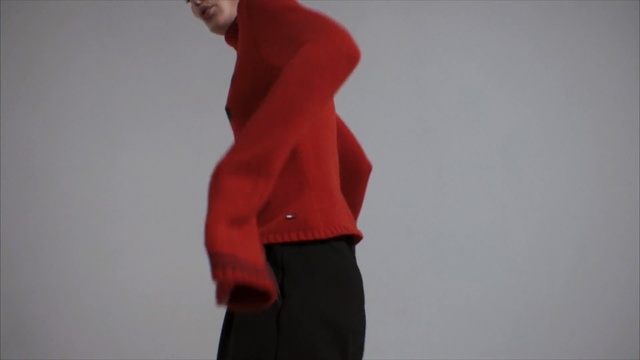 Video Reference: red, standing, shoulder, joint, sleeve, outerwear, arm, neck, muscle, abdomen