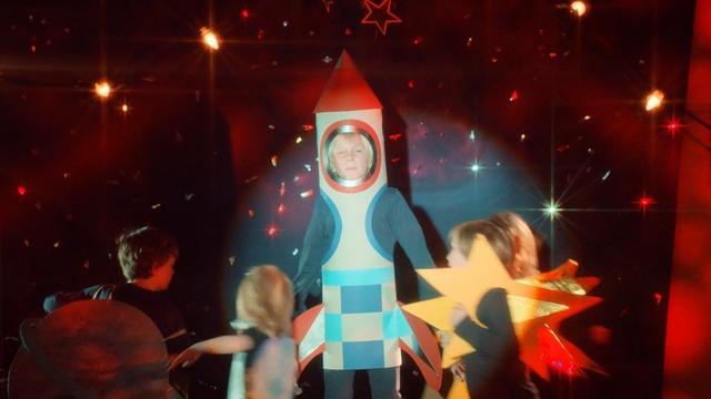 Video Reference: red, entertainment, event, light, stage, performance, lighting, fun, darkness, performance art, Person