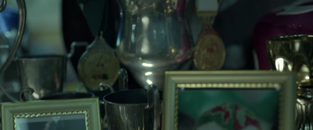 Video Reference: blue, glass, glass bottle, bottle, wine glass, drinkware, stemware, alcohol, liqueur, drink