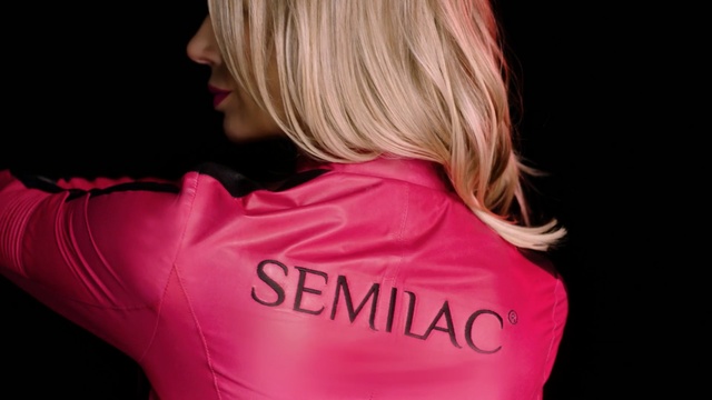 Video Reference: Hair, Pink, Clothing, Blond, Red, Hairstyle, Shoulder, Neck, Chin, Lady