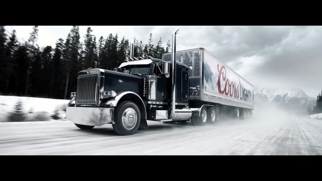 Video Reference: Land vehicle, Vehicle, Transport, trailer truck, Truck, Mode of transport, Commercial vehicle, Freight transport, Car, Trailer, Person