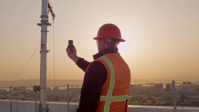 Video Reference: Blue-collar worker, Engineer, Hard hat, Construction worker, Headgear, Temple, Personal protective equipment, Hat, Person