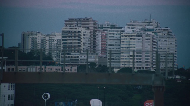 Video Reference: Metropolitan area, Sky, Urban area, City, Human settlement, Metropolis, Atmospheric phenomenon, Tower block, Architecture, Cityscape