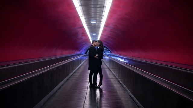 Video Reference: red, infrastructure, mode of transport, light, escalator, darkness, lighting, line, fixed link, symmetry