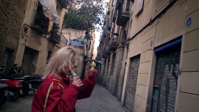 Video Reference: Alley, Photograph, Street, Neighbourhood, Town, Snapshot, Human settlement, Road, Urban area, Infrastructure