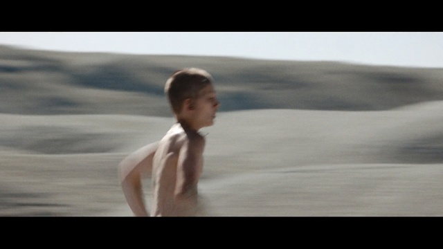 Video Reference: child, vessel, tub, bath towel, towel, person, kid