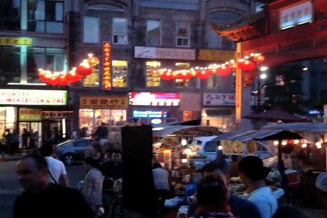 Video Reference: city, urban area, night, street, crowd, downtown, metropolis, pedestrian, metropolitan area, evening