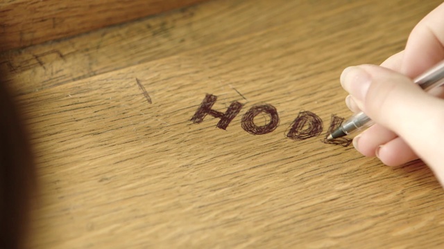 Video Reference: Wood, Text, Wood stain, Handwriting, Font, Hardwood, Finger, Hand, Writing, Material property