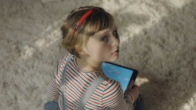 Video Reference: Hair, Child, Technology, Electronic device, Neck, Person