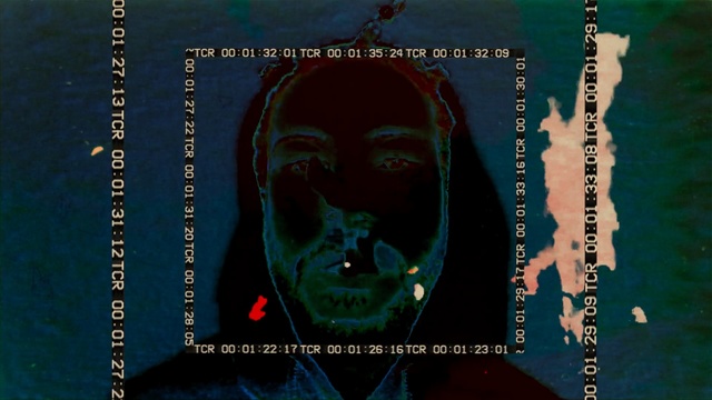 Video Reference: text, darkness, album cover, organism, screenshot, font, midnight, facial hair, computer wallpaper, film