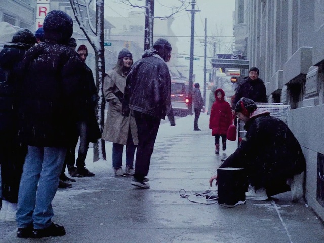 Video Reference: People, Urban area, Street, Standing, Snapshot, Pedestrian, Human, Crowd, Winter, Black-and-white, Person
