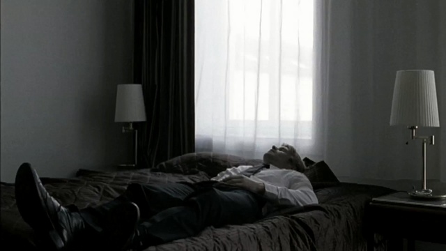 Video Reference: black, room, interior design, light, bedroom, black and white, lighting, light fixture, window, bed