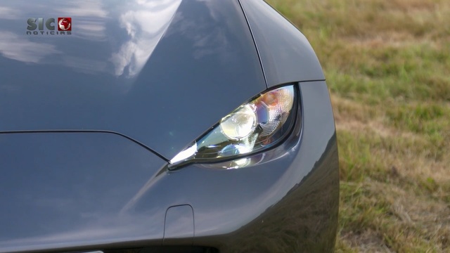 Video Reference: car, motor vehicle, vehicle, automotive design, mode of transport, personal luxury car, luxury vehicle, sports car, wheel, performance car, Person