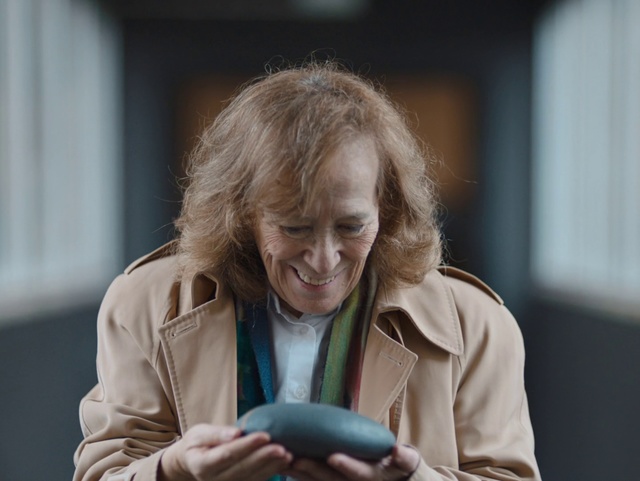 Video Reference: Gadget, Smile, Photography, Electronic device, Reading, Sitting