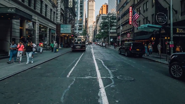 Video Reference: Road, Lane, Street, Urban area, Downtown, City, Town, Human settlement, Metropolis, Metropolitan area