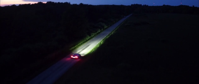 Video Reference: sky, infrastructure, light, mode of transport, night, atmosphere, geological phenomenon, lighting, road, line