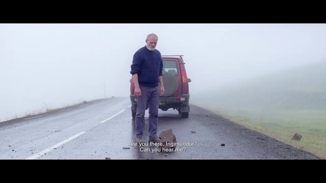 Video Reference: Atmospheric phenomenon, Mode of transport, Fog, Asphalt, Vehicle, Human, Photography, Road, Car, Mist