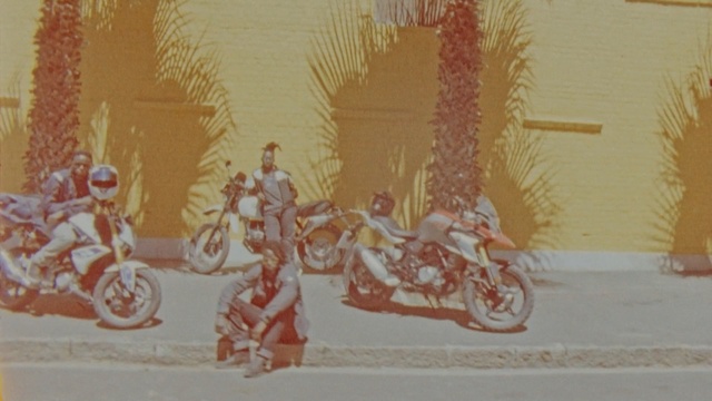 Video Reference: Text, Wall, Art, Vehicle, Visual arts, Organism, Font, Modern art, Painting, Mural